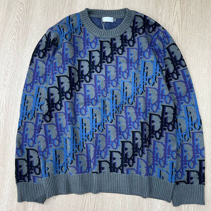DC1   Unisex All-over Multicolor Logo Jacquard Crew Neck Sweater clothes